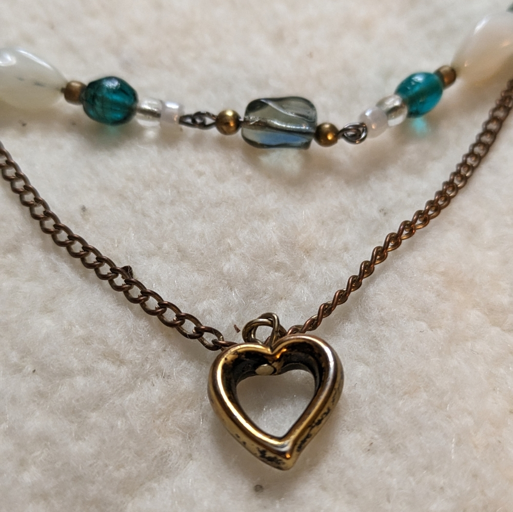 Handmade white, green, blue, and gold necklace
